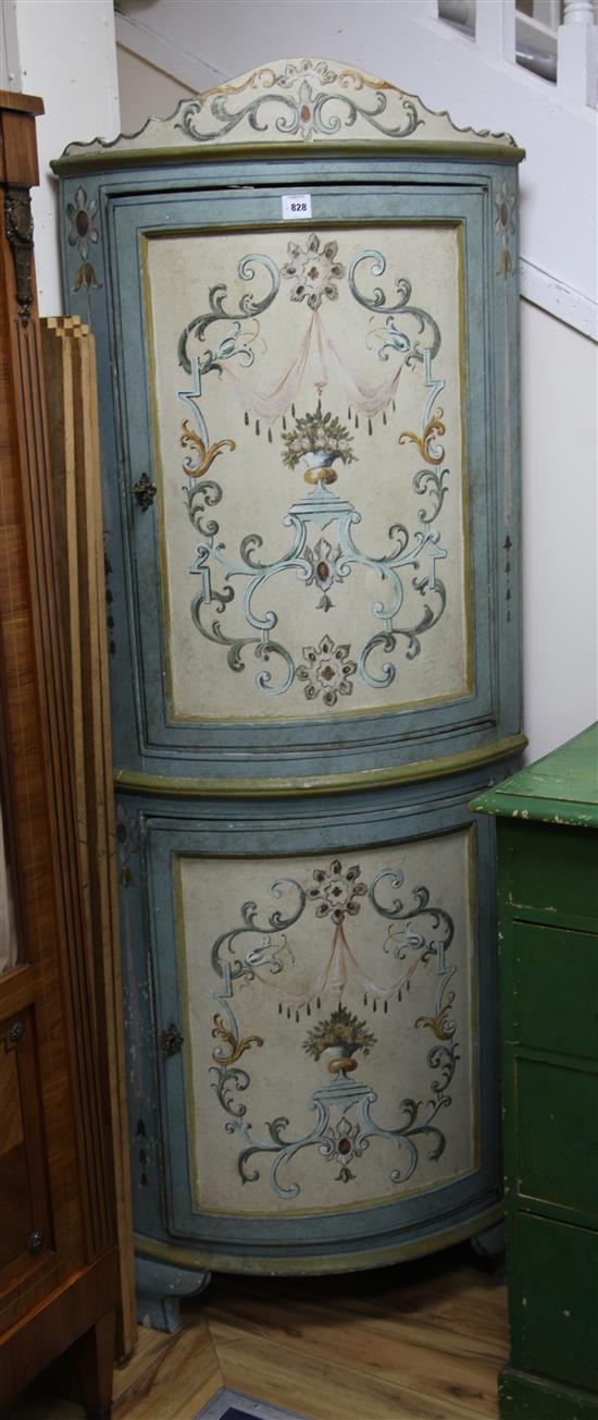 An Italian 18th century design painted bowfronted standing corner cupboard,